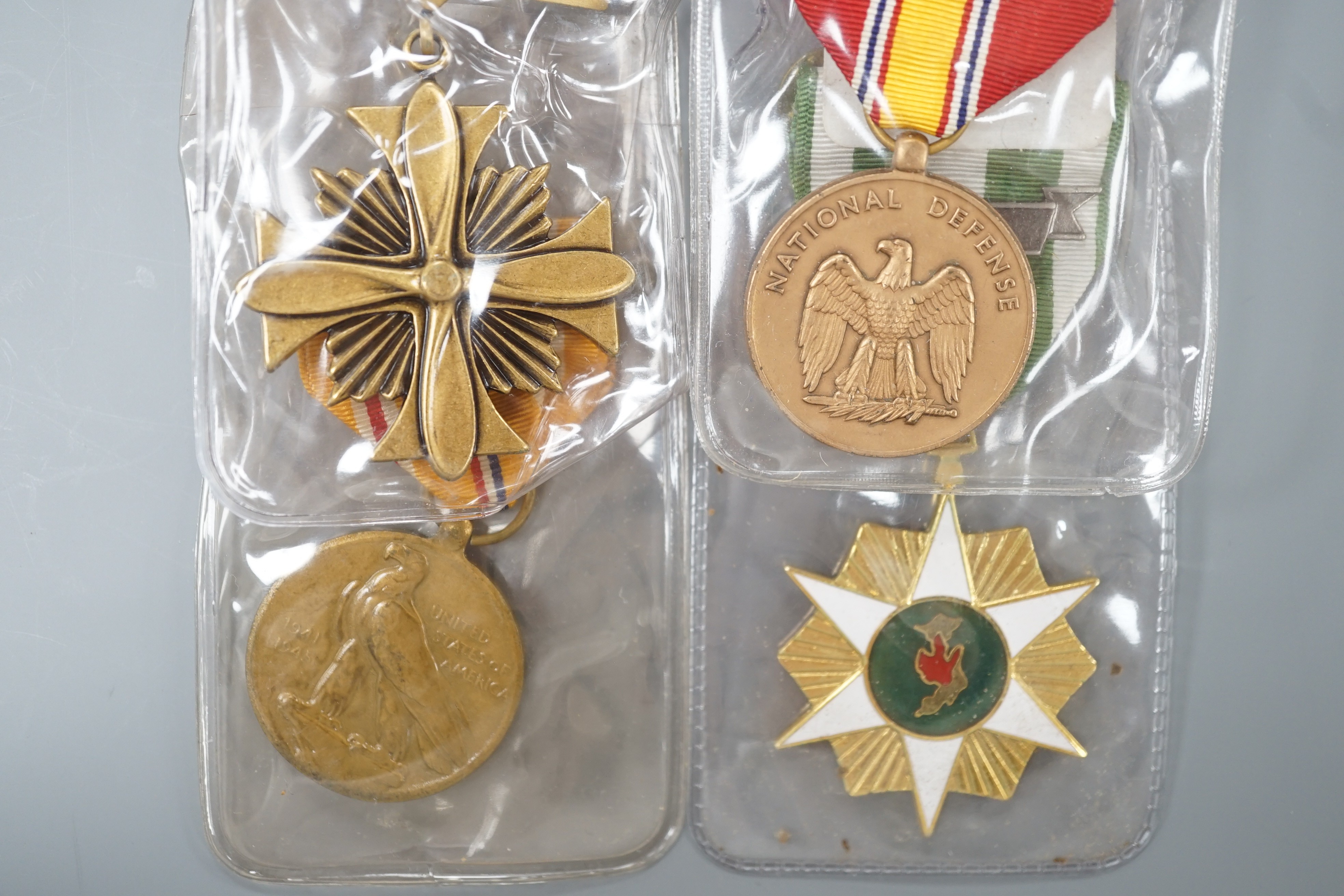 Four U.S. forces unnamed military medals to include